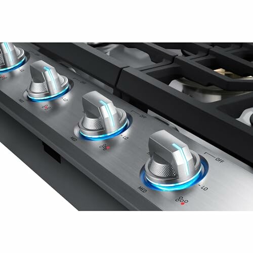 Close-up of Stainless Steel Stove Control Knobs